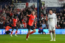 Mads Andersen celebrates scoring Town’s first home Premier League goal but it’s too late