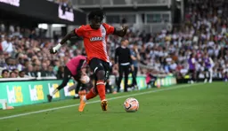 Issa Kabore passing in field