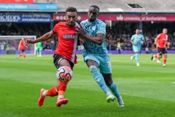 Jacob Brown holds off the defender