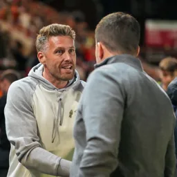 Boss greets Exeter Manager Gary Caldwell