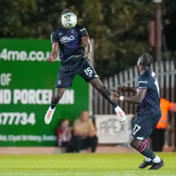 Teden Mengi behind the ball