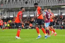 Elijah Adebayo gets congratulations from Ogbene