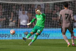 Thomas Kaminski fires the ball past Son