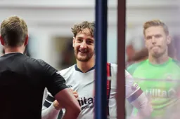 Tom Lockyer has a word with the Referee