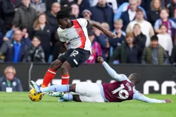 Issa Kabore tackled by Diaby