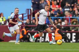 Ross Barkley skips past Villa’s John McGinn