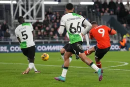 Carlton Morris fires from just inside the box