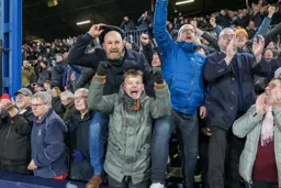 Fans celebrate first home win