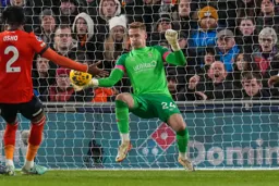 Thomas Kaminski makes an unorthodox save