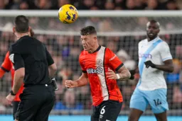 Ross Barkley heads for goal with his eyes closed