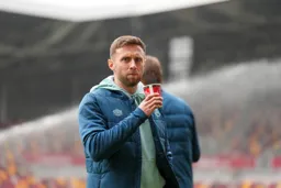 Jordan Clark with a warming cofee