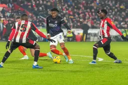 Gabriel Osho surrounded