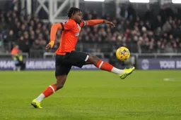 Pelly Mpanzu controls the ball