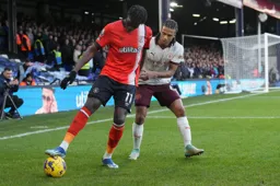 Elijah Adebayo shields the ball