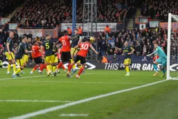Andros Townsend heads home the winning goal
