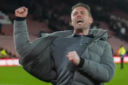 Rob Edwards celebrating