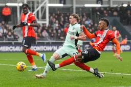 Jacob Brown gets past Conor Gallagher