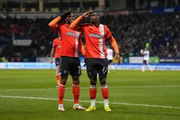 Chiedozie Ogbene and Pelly Ruddock salute the travelling fans