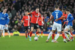 Cauley Woodrow takes on the Everton defence