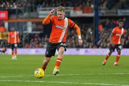 Alfie Doughty carries the ball into the box