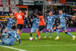 Tahith Chong scores the Town opener