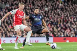 Andros Townsend challenging Arsenal’s Zinchenco