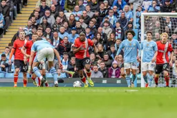 Pelly Mpanzu clearing his defence