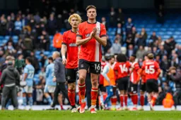 Reece Burke thanks the supporters