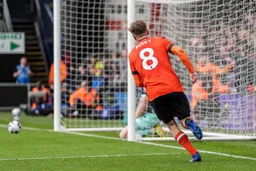 Luke Berry wheels away after scoring