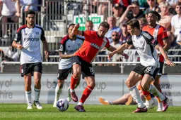 Jordan Clark surrounded