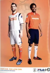 Alex Lawless and Anthony Charles showing off the 2013/14 kit