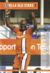 Marvin Johnson celebrating his goal in a legends match 2012:13 Programme Article