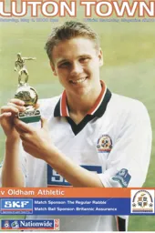 Matthew Taylor programme cover showing off his Young Player of the Year award - 99:00 programme feature