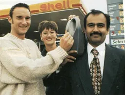 Scott Oakes promoting a local Shell garage - 95-96 programme feature