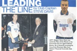 Steve Davis showing off his man of the match mountain bike - 96-97 programme feature