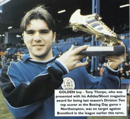 Tony Thorpe with the Adidas:Shoot award for being the top bagsman in Division Two - 97:98 programme feature
